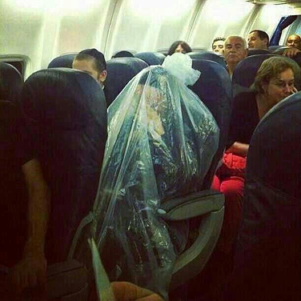 An Orthodox Jew in an airplane with women - so he covers himself with a plastic bag... - Imgur