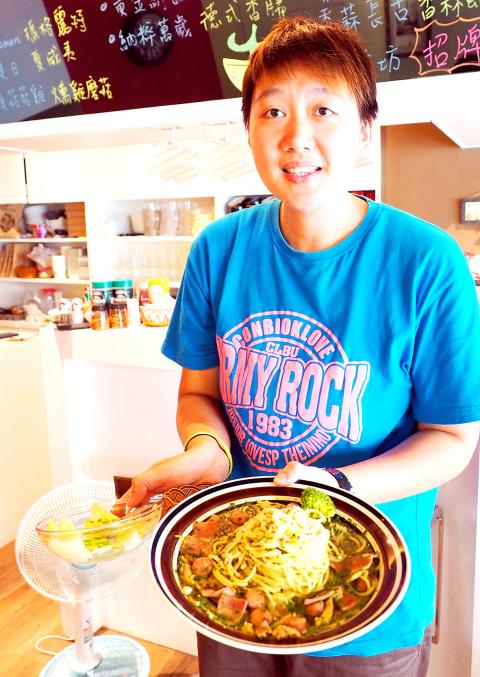 Tsao Ya-hsin and a plate of "Love Live Nazi Spaghetti." (Photo: David Chang, via)